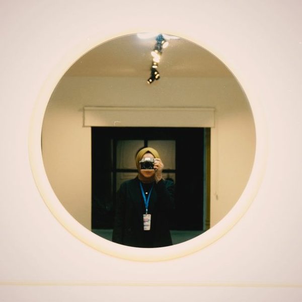 Frameless Arched Hand Mirror